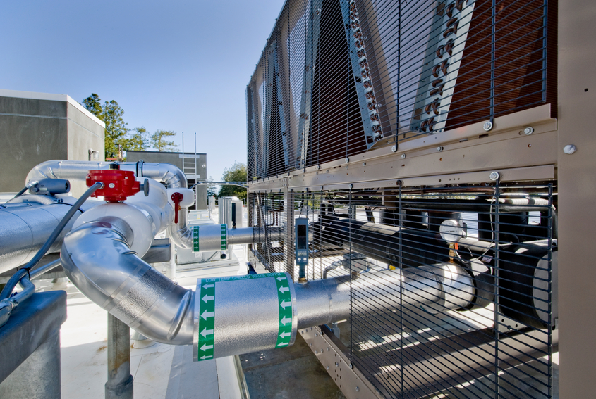 Cooling tower with insulated pipes for HVAC installation.Click on any of the thumbnails below to see more HVAC Installations: